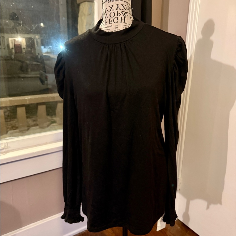 Chic Black Women's Blouse with Puff Sleeves and gathered wrists.